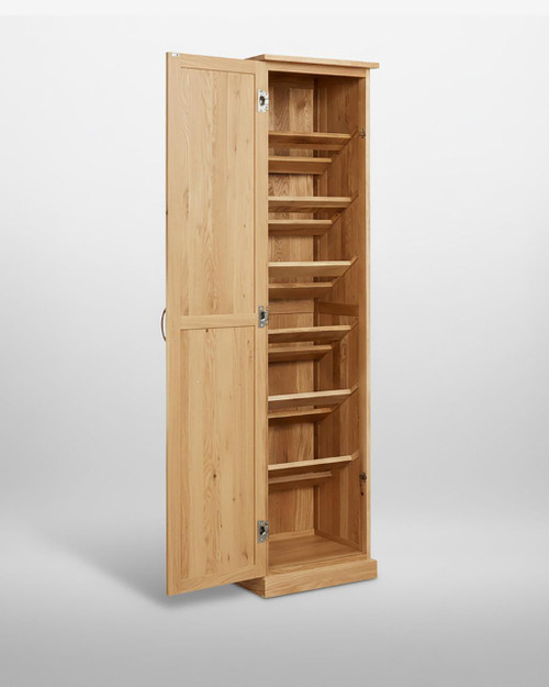 Mobel Oak Tall Shoe Cupboard COR20E, wooden shoe storage cabinet with multiple shelves and a single door in natural oak finish. Mobel Oak Tall Shoe Cupboard COR20E, wooden shoe storage cabinet with multiple shelves and a single door in natural oak finish.