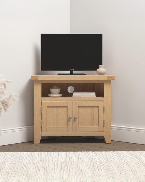 Hampton Oak Corner TV Unit HO300-305-058, wooden TV stand with open shelf and two cabinet doors, suitable for living room entertainment storage. Hampton Oak Corner TV Unit HO300-305-058, wooden TV stand with open shelf and two cabinet doors, suitable for living room entertainment storage.