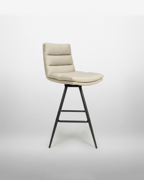 Hamilton Swivel Counter Chair in Truffle, cream upholstered seat with horizontal padding, black metal base with four slim legs and footrest, sold as a pair. Hamilton Swivel Counter Chair in Truffle, cream upholstered seat with horizontal padding, black metal base with four slim legs and footrest, sold as a pair.