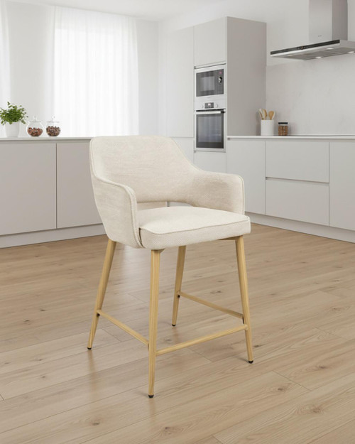 Stanley Natural Kitchen Counter Chair (Sold as Pair), modern off-white upholstered counter stool with wooden legs in a minimalist white kitchen setting. Stanley Natural Kitchen Counter Chair (Sold as Pair), modern off-white upholstered counter stool with wooden legs in a minimalist white kitchen setting.
