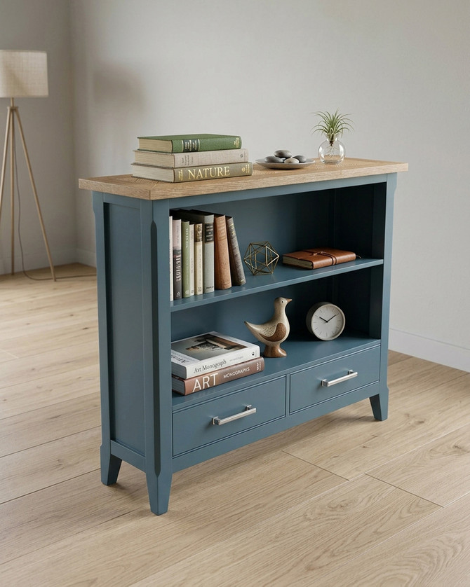 Anchorage Blue Low Bookcase WFS-BH-ANC01A, blue wooden bookcase with two open shelves and two drawers at the bottom, featuring a natural wood top surface.