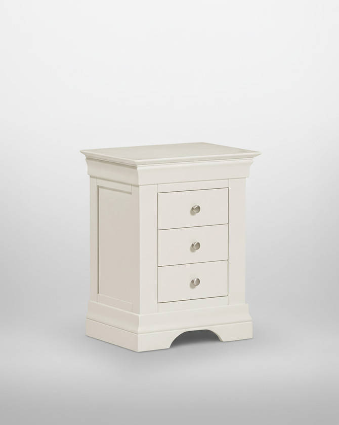 Vermont 3 Drawer Bedside in Ivory VM100-103-120, a stylish white bedside table with three drawers and round metallic knobs.