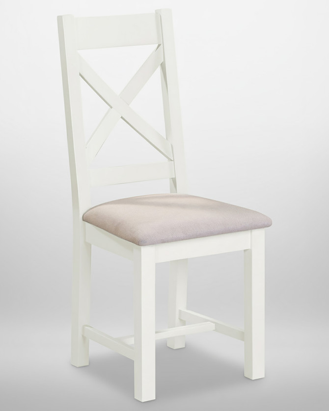 Hampton Ivory Cross Back Chair, Set of 2, ivory painted wooden chair with upholstered beige seat and X-shaped back design.