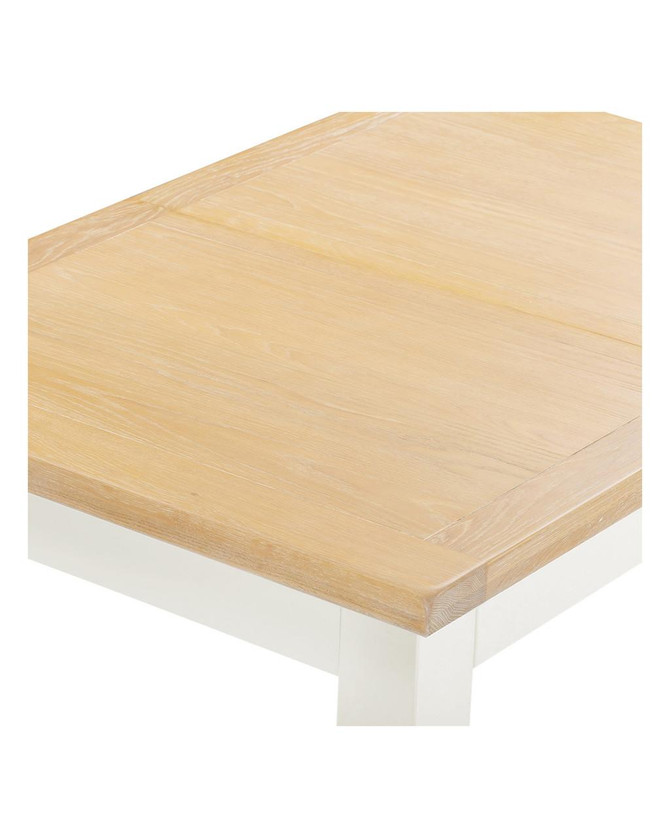 Hampton Ivory Extending Dining Table HI400-403-077, close-up of the wooden tabletop showing its light ivory finish and smooth surface, with part of the white leg visible.