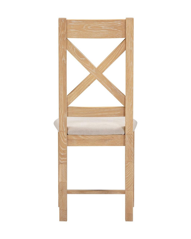 Hampton Oak Cross Back Chair, product image of a light oak wooden chair with a cross-back design and a cushioned seat.