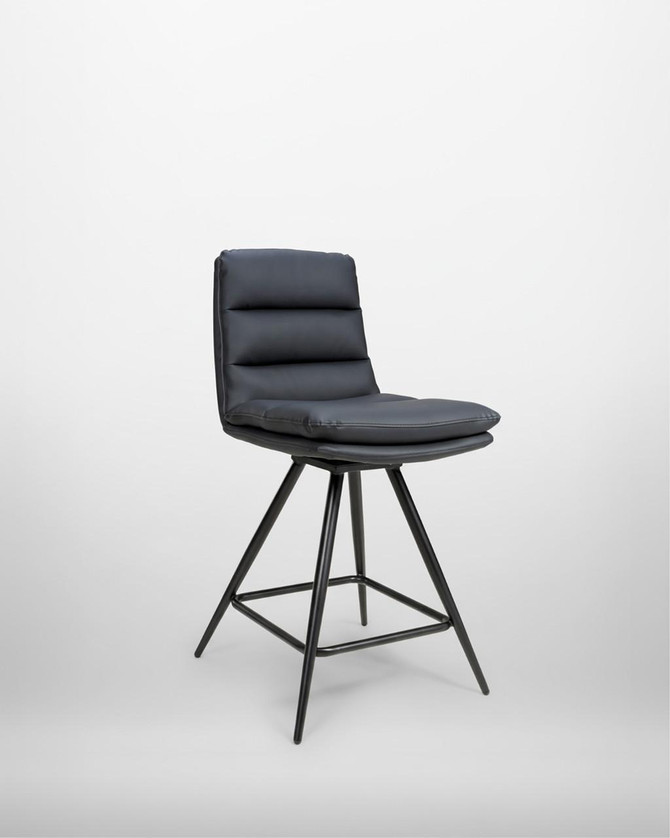 Hamilton Swivel Counter Chair in Black, image showing a modern black leather swivel counter chair with a cushioned seat and backrest, supported by a sleek black metal frame and elevated on a four-legged base. Hamilton Swivel Counter Chair in Black, image showing a modern black leather swivel counter chair with a cushioned seat and backrest, supported by a sleek black metal frame and elevated on a four-legged base.