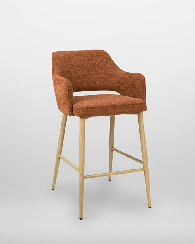 Stanley Rust Coloured Bar Chair, modern bar stool with rust-colored upholstered seat and backrest, wooden legs, sold as a pair. Stanley Rust Coloured Bar Chair, modern bar stool with rust-colored upholstered seat and backrest, wooden legs, sold as a pair.