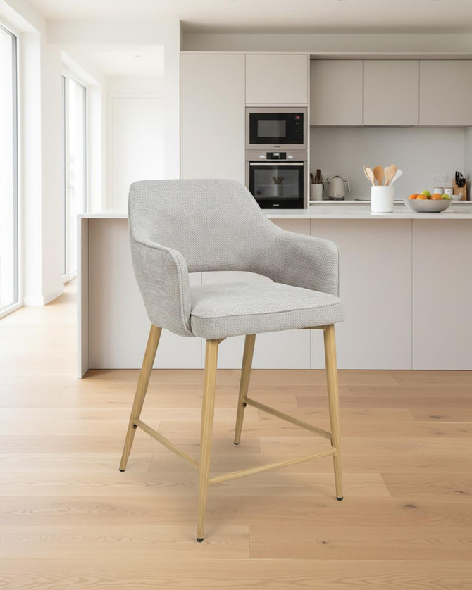 Stanley Petewer Kitchen Counter Chair, pair of modern upholstered kitchen counter chairs with light wood legs and gray fabric, ideal for kitchen island seating. Stanley Petewer Kitchen Counter Chair, pair of modern upholstered kitchen counter chairs with light wood legs and gray fabric, ideal for kitchen island seating.