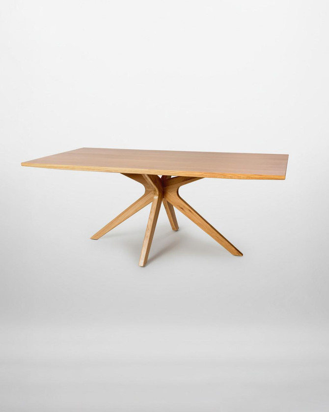 Stanley 200cm Table, wooden dining table with modern angular design and sturdy four-legged base.
