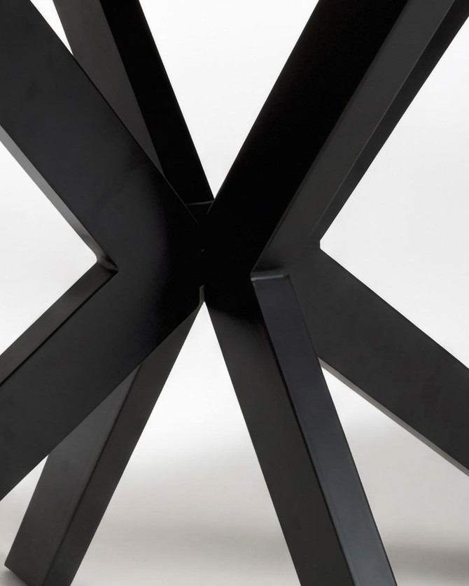 Roma 180cm Distressed Oak Dining Table, close-up view highlighting the black metal X-shaped legs and distressed oak tabletop.