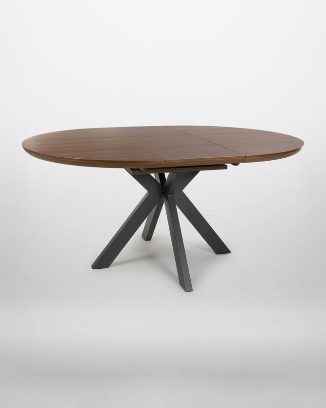 Hamilton Smoked Oak Round 120cm - 160cm Extending Table, showcasing a wooden round dining table with a smoked oak finish and a black X-shaped metal base.