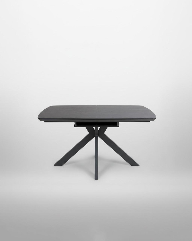 Hamilton Black Ash Extending Table 140cm - 180cm Table, black extendable dining table with a modern design and slanted legs.