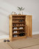 Stockbury Solid Oak Large Shoe Cabinet WFS-BH-SBO20D, wooden shoe storage cabinet with multiple shelves and a single door, crafted from oak wood, ideal for organizing shoes in the entryway. Stockbury Solid Oak Large Shoe Cabinet WFS-BH-SBO20D, wooden shoe storage cabinet with multiple shelves and a single door, crafted from oak wood, ideal for organizing shoes in the entryway.