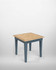 Anchorage Blue Extending Dining Table WFS-BH-ANC04A, a modern dining table with a light wooden top and blue legs, in an extended position.