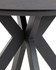 Hamilton 120cm Black Ash Round Table, close-up view of the black ash wood tabletop with crossed black metal legs.