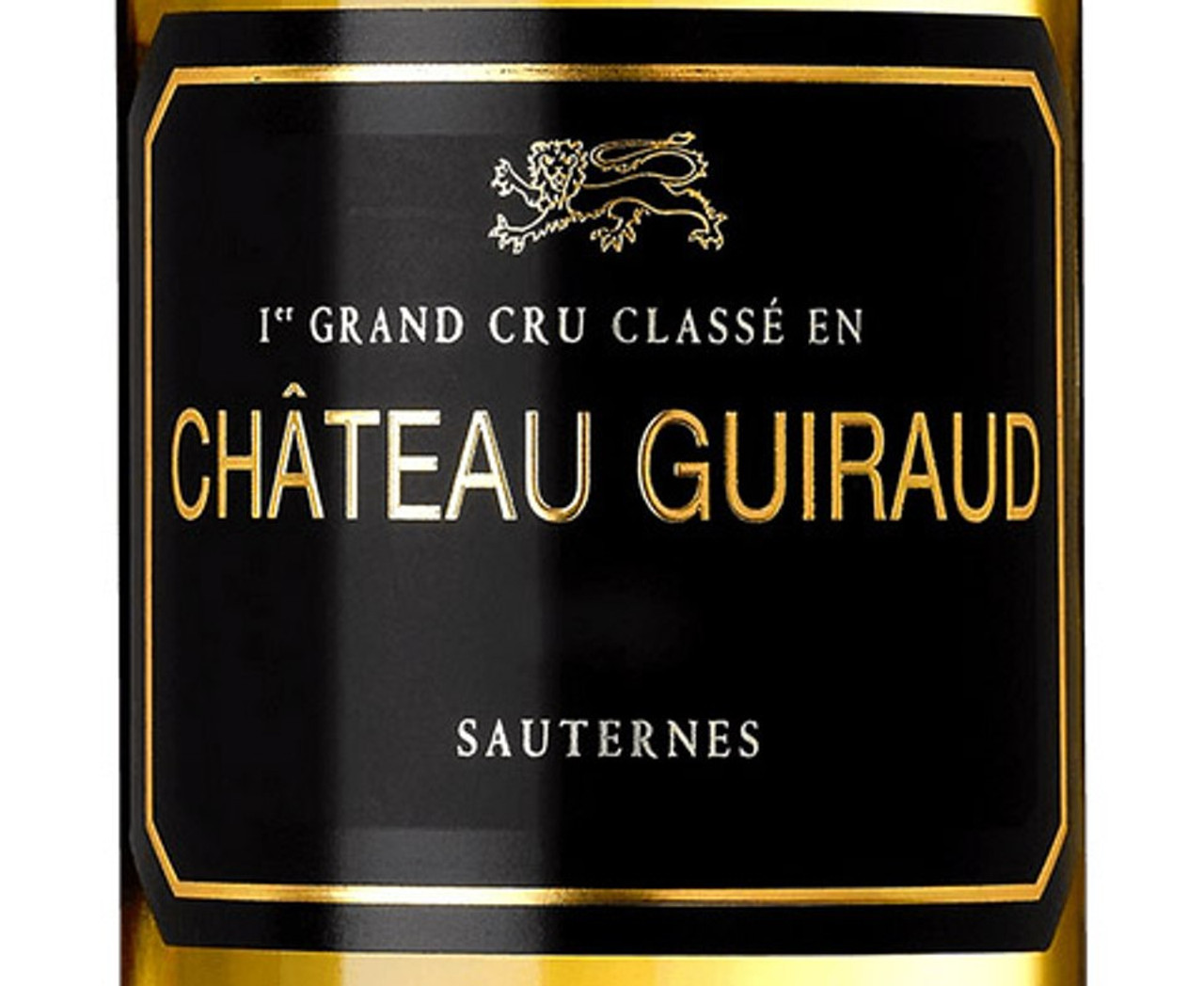 Château Guiraud Sauternes dessert wine bottle with elegant black and gold label.