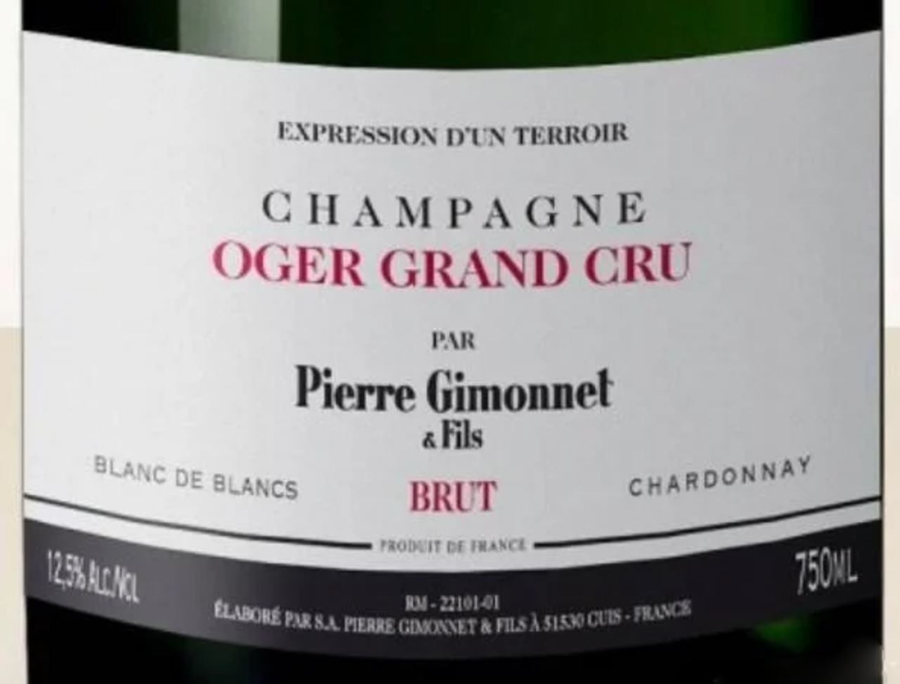 Close-up of Pierre Gimonnet & Fils Oger Grand Cru Champagne Brut bottle label, highlighting Blanc de Blancs and Expression d'un Terroir.