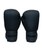 Two matte black boxing gloves with a 9Round logo on the cuff