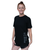  woman in a black shirt with her hair up in a bun and smiling toward the camera