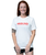 A woman wearing a white t-shirt that has a red logo that reads 9Round Kickboxing Fitness