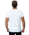 A man facing away from the camera wearing a white t-shirt with nothing pictured on the back