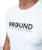 A close up of the logo on a white t-shirt that reads 9Round Kickboxing Fitness in black text