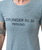 A close up of a grey t-shirt that reads, "Stronger in 30 9Round"