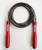 A flat lay image of a jump rope with a black cord and red metal handles with a white 9Round logo