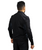 A man is shown from the back wearing a black long-sleeve jacket and black pants against a white background.