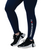 Person wearing black athletic shoes and navy blue leggings with the text I LOVE KICKBOXING printed vertically on the lower leg.