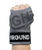 A hand wrapped in gray fabric boxing wraps with a visible 9ROUND logo on the wrist.