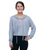A woman stands smiling, wearing a light gray 9ROUND hoodie and black leggings against a plain white background.
