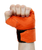 A person making a fist in the air with their hand wearing n orange boxing hand wrap 