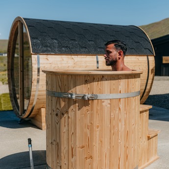 Men Enjoying His Redwood Outdoors Cold Plunge Outside.