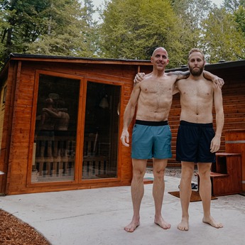 Friends hanging out outside of their Garden Sauna