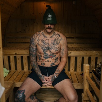 Man in Sauna with Hat