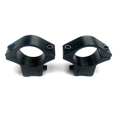 1" Scope Rings, designed to mount a rifle scope with a 1-inch diameter tube securely to a firearm. The rings are made of durable material and feature precision-engineered construction to ensure a tight and stable fit. They include screws for secure attachment and are suitable for various types of rifles, providing reliable performance for hunters and sport shooters.