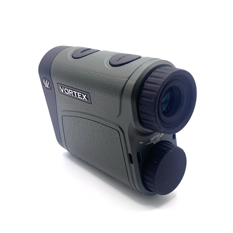 Vortex Impact 1000 Laser Rangefinder, featuring a compact and ergonomic design. The rangefinder has a black and gray body with clearly marked buttons and a display screen, designed to provide precise distance measurements up to 1000 yards. The device is ideal for hunting, shooting, and outdoor activities, offering accurate and reliable performance.