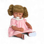 Charlotte 20-inch baby doll with blonde hair in pigtails, blue eyes, pink lace dress, and pacifier – collectible vinyl doll made in USA.