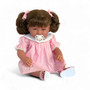 Ann Lauren Dolls Baby Dimples brunette toddler doll with brown hair in pigtails, blue eyes, pink smocked dress, white sandals, and pacifier.
