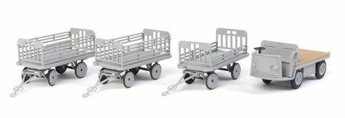 Walthers SceneMaster ~ HO Scale ~ Baggage Tractor and Trailers ~ Plastic Kit ~ Non-Powered Tractor and 3 Trailers (gray) ~ 949-4141