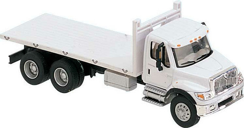 Walthers SceneMaster ~ HO Scale ~ International 7600 3-Axle Flatbed Truck ~ Assembled ~ White with Railroad Maintenance-of-Way Logo Decals ~ 949-11650