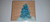 pine tree painted on wood blocks