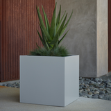 Square urban fiberglass planter in Dove finish planted with succulents