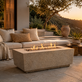 Rocher fire table shown in rustico in covered area with mountains in background