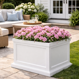 Square Keswick in White with pink flowers on a back patio