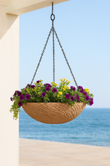 Roman Pond Fiberstone Hanging Basket hanging with ocean in background