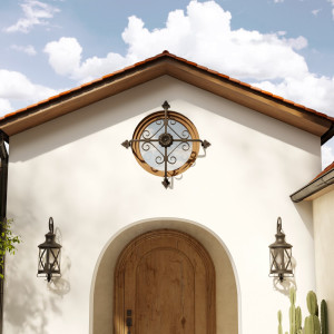 18" x 18" Carillo Wrought Iron Exterior Accent mounted on a Mediterranean home.