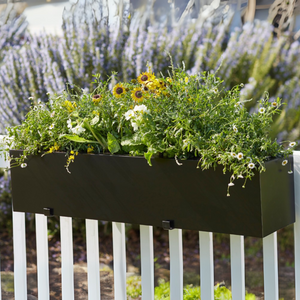 Modern Black Planter on wood fence Modern Black Planter on wood fence