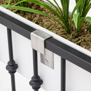 Stainless Steel Balcony Brackets installed on white PVC window box Stainless Steel Balcony Brackets installed on white PVC window box
